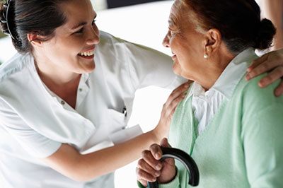 Nurse caring for elderly patient