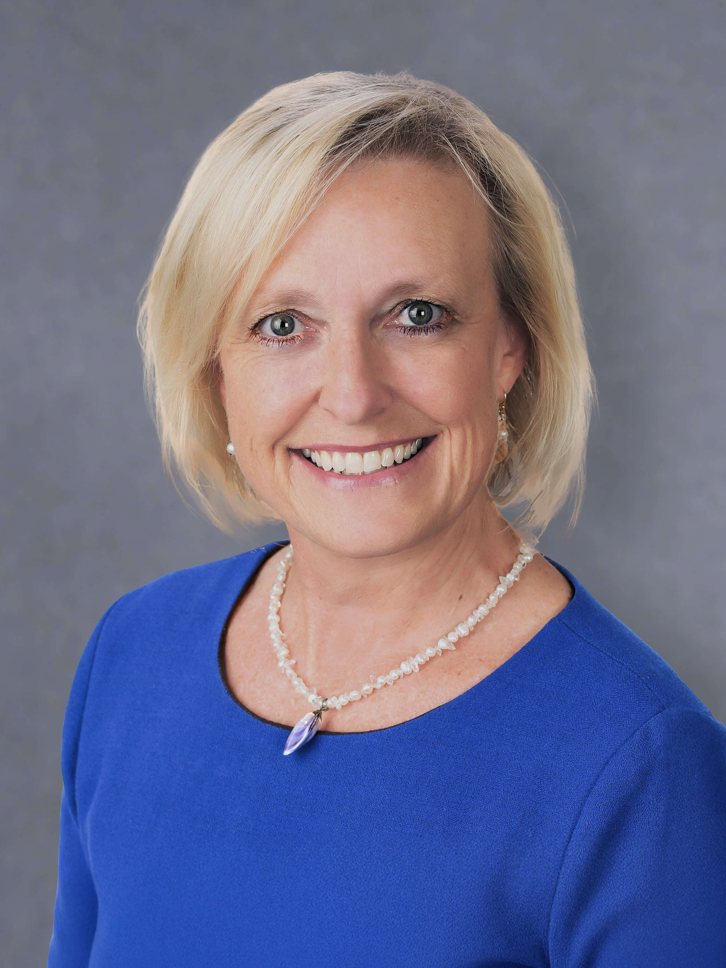 a woman wearing a blue shirt